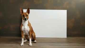 Adorable brown and white basenji dog holding a large blank white sign in a studio with white walls AI Generated photo