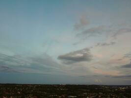 High Angle view of Beautiful Clouds and Sky over Luton City During Sunset photo