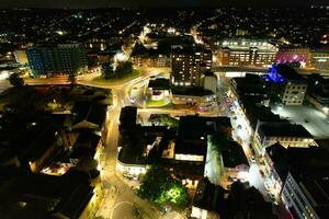 Aerial View of Illuminated Downtown Buildings, Roads and Central Luton City of England UK at Beginning of Clear Weather Night of September 5th, 2023 photo