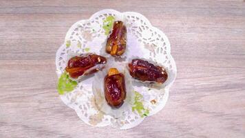 Dates or dates palm fruit in the wooden bowl is snack healthy photo