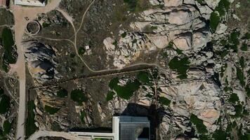 Aerial top down view of Faro di Maritimo lighthouse in Capo Testa Sardinia video