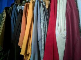 pattern of hanging clothes neatly arranged photo