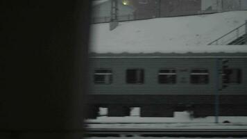 Traveling by train on dull winter day video