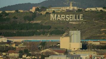 Marseille view with city name on green hills, France video