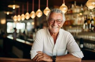 An old man is laughing in a pub photo