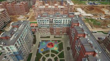 An aerial view of a construction area in a residential buildings complex video