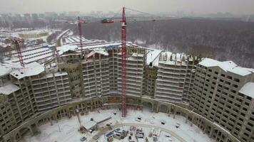 An aerial view of a huge winter building construction zone video