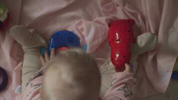 Baby playing with interactive toys at home video