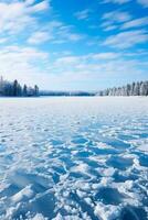 Frozen lake surface in the countryside background with empty space for text photo