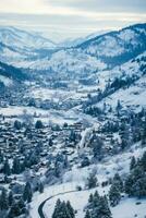 Snow blanketed small town view from overhead background with empty space for text photo