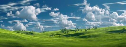 A scenic green grass field on hills under a clear blue sky. Filled with various grasses, it's used for pasturage and rural scenery. photo