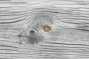 Striking contrast of a textured wooden board on white wood. AI Generated photo