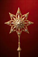 Victorian style Christmas tree topper a golden star gleaming with sparkle isolated on a holiday red gradient background photo