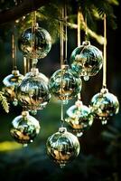 Classic 20th-century glass baubles hanging from a pine tree reflecting the joy and tradition of a bygone era photo