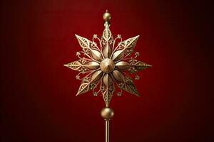 Victorian style Christmas tree topper a golden star gleaming with sparkle isolated on a holiday red gradient background photo