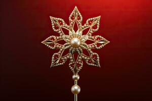 Victorian style Christmas tree topper a golden star gleaming with sparkle isolated on a holiday red gradient background photo