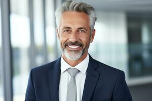 a business man smiling at the camera photo