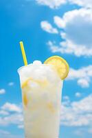 Bright Summer Image of Iced Lemonade in Glass with Lemon Slice and Straw photo