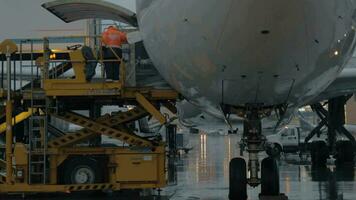 A busy and rainy evening at the airport courtyard video