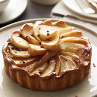 Upside down puff pastry apple tart on a breakfast plate. AI Generative photo