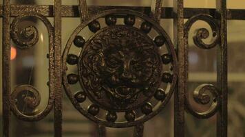 Wrought iron gates with lion head video