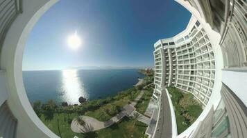 Scene with waterfront hotel and sea in Antalya, Turkey video