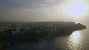 Urban coastal city at sunrise video