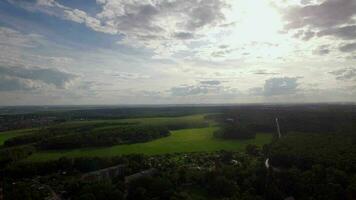 Flying over township in green woods Rural landscape in Russia video