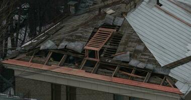 Workers repairing old roof of the house video