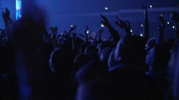 Crowded concert hall with excited fans video