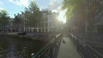 Amsterdam view with footbridge over the canal, Netherlands video