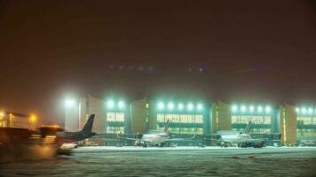 Timelapse shot of Sheremetyevo Airport routine at winter night, Moscow video