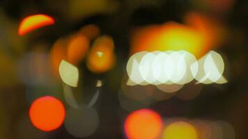 Abstract background with defocused city lights at night video