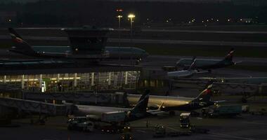 Night view of Sheremetyevo Airport with Aeroflot airliners video