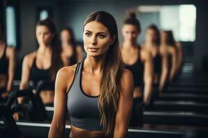 Concentrated individuals performing detailed Pilates Reformer movements at a premium fitness club photo