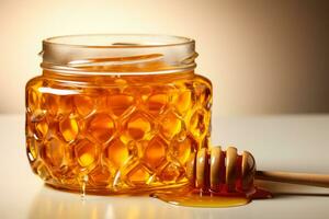 A streamlined honey jar and honeycomb isolated on a gradient white and beige background photo