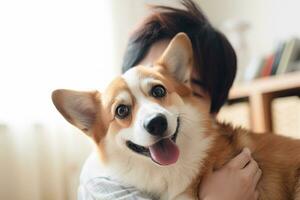 portrait of man and woman hugging cute corgi dog. pet concept photo