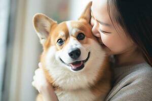 portrait of woman hugging cute corgi dog. pet concept photo