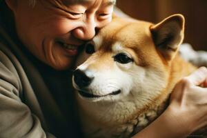 portrait of man and woman hugging cute shiba inu dog. pet concept photo