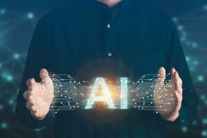 Businessman holding AI Artificial Intelligence icon.AI Chat bot, Futuristic technology, innovation technology and robot concept. photo