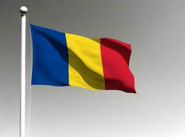 Romania national flag waving on gray background photo