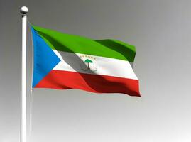 Equatorial Guinea national flag waving on gray background photo