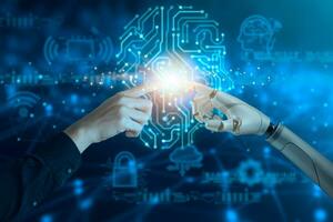 Business man hand and robot hand pointing digital screen of AI icon artificial intelligence.big data, technology, futuristic concept photo