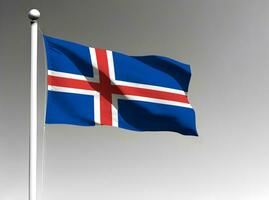 Iceland national flag waving on gray background photo