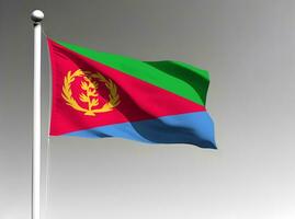 Eritrea national flag waving on gray background photo