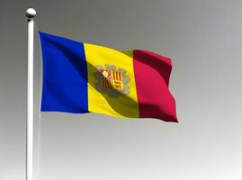 Andorra national flag waving on gray background photo