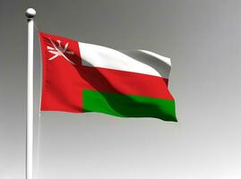 Oman national flag waving on gray background photo