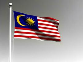 Malaysia national flag waving on gray background photo