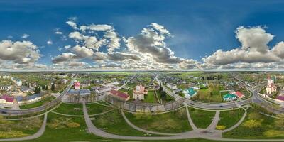 aerial hdri 360 panorama view from great height on buildings, churches and center square of provincial city in equirectangular  seamless spherical  projection. may use as sky replacement for drone photo