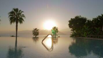 Swimming pool on resort, view against the sunset video